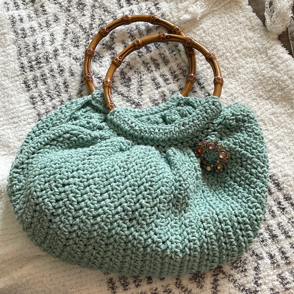 Handmade crochet purse with beautiful broach pin, sturdy handles